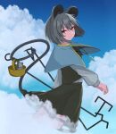 1girl animal_ears bangs basket blue_capelet blue_sky capelet closed_mouth clouds commentary_request crystal dowsing_rod feet_out_of_frame flat_chest flying grey_hair grey_skirt grey_vest hair_between_eyes holding jewelry long_sleeves long_tail looking_at_viewer mashiba_lei mouse mouse_ears mouse_girl mouse_tail nazrin orange_eyes pendant shirt short_hair skirt skirt_set sky smile solo tail touhou vest white_shirt