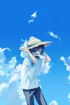  1boy bangs black_pants blue_hair blue_sky child closed_eyes clouds commentary day eyepatch genshin_impact hair_between_eyes hand_on_headwear hat highres kaeya_(genshin_impact) male_child male_focus open_mouth outdoors pants ponpo321 shirt short_sleeves sky solo straw_hat symbol-only_commentary white_shirt younger 
