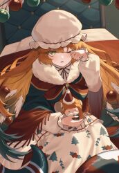  1girl absurdres bed christmas_nightmare_(e.g.o) christmas_ornaments christmas_ornaments_in_hair commentary e.g.o_(project_moon) green_eyes hat highres ishmael_(project_moon) limbus_company long_hair looking_at_viewer mob_cap neck_ribbon nhom_(woogi) open_mouth orange_hair project_moon ribbon rubbing_eyes sitting solo stuffed_animal stuffed_sheep stuffed_toy tentacles very_long_hair white_hat 