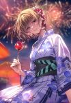  1girl aerial_fireworks blue_eyes blush brown_hair candy_apple fireworks floral_print food head_tilt highres holding holding_food idolmaster idolmaster_cinderella_girls japanese_clothes kimono mole mole_under_eye obi parted_lips piromizu print_kimono sash short_hair smile solo takagaki_kaede 