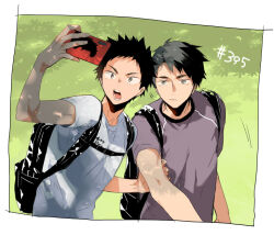  2boys backpack bag black_hair border cellphone closed_mouth commentary_request grass haikyuu!! hand_on_another's_arm iwaizumi_hajime konno_seara male_focus multiple_boys open_mouth outdoors phone selfie shirt short_hair smartphone t-shirt teeth ushijima_wakatoshi very_short_hair white_border white_shirt 