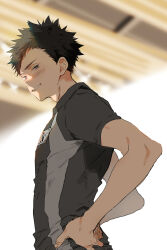  1boy black_hair black_shirt blurry blurry_background coach commentary_request from_below from_side haikyuu!! hands_on_own_hips highres iwaizumi_hajime konno_seara male_focus shirt short_hair solo teeth upper_body very_short_hair 