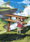  1girl :d absurdres bird bow brown_eyes brown_hair cezhan_renoude chinese_commentary cliff clouds commentary copyright day detached_sleeves floating_hair frilled_bow frilled_hair_tubes frills grass hair_bow hair_tubes hakurei_reimu hand_up highres long_hair looking_at_viewer mountain open_mouth outdoors path red_bow red_skirt red_vest ribbon-trimmed_skirt ribbon-trimmed_sleeves ribbon_trim rock scenery skirt skirt_set sky smile socks solo standing teeth torii touhou upper_teeth vest white_sleeves white_socks wide_shot wide_sleeves 