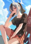  1girl absurdres bangs between_legs black_hair black_shirt blue_archive blush bright_pupils clouds feet_out_of_frame food grey_hair half-closed_eyes halo hand_between_legs highres horns kayoko_(blue_archive) kuro_shiraga looking_at_viewer medium_hair mouth_hold multicolored_hair outdoors ponytail popsicle red_eyes red_skirt shirt short_sleeves sidelocks sitting skirt skirt_hold solo sweat two-tone_hair white_pupils 