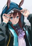  1girl :o absurdres amiya_(arknights) animal_ear_fluff animal_ears arknights arms_up ascot bangs black_jacket blue_eyes brown_hair commentary_request ears_through_headwear grey_background hair_between_eyes highres hood hood_up hooded_jacket jacket jessmka7 jewelry long_hair long_sleeves looking_at_viewer parted_lips puffy_long_sleeves puffy_sleeves purple_ascot rabbit_ears ring shirt solo upper_body white_shirt 