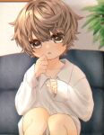  1boy blush brown_eyes brown_hair child couch head_tilt long_sleeves looking_at_viewer male_child male_focus open_mouth original shirt short_hair shorts sitting solo toron_0812 white_shirt 