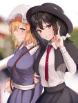  2girls bangs black_capelet black_skirt blonde_hair blurry blurry_background blush bow bowtie breasts brown_eyes brown_hair buttons capelet closed_mouth commentary_request dress feet_out_of_frame fingernails frilled_shirt_collar frilled_sleeves frills fumei_(mugendai) grin hair_ribbon hat hat_bow hat_ribbon highres holding holding_another&#039;s_arm holding_clothes large_breasts looking_at_viewer maribel_hearn mob_cap multiple_girls neck_ribbon necktie purple_dress red_bow red_bowtie red_necktie red_ribbon ribbon shirt sideways_glance skirt smile standing teeth touhou tress_ribbon two-sided_fabric upside-down usami_renko v violet_eyes white_headwear white_ribbon white_shirt 