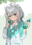  1girl alternate_costume bangs blush bottle grey_eyes grey_hair hair_between_eyes hair_ornament headgear highres holding holding_bottle i-201_(kancolle) jacket kantai_collection long_hair long_sleeves looking_at_viewer low_twintails porupurucha ramune smile solo tassel twintails upper_body x_hair_ornament 