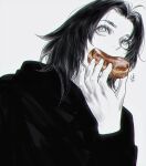 1boy covered_mouth eating eyelashes fingernails food from_below hand_up hanes_025 highres holding holding_food long_sleeves looking_away looking_up medium_hair monochrome original portrait simple_background slit_pupils solo spot_color 