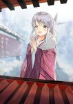 1girl :d absurdres blurry blurry_background blush fur_trim grey_hair hatsumoude highres japanese_clothes kimono original outdoors own_hands_together pink_kimono shrine smile snow standing tobiohana_(c1774074314) wide_sleeves winter yellow_eyes 