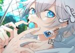  1boy androgynous bandaid bandaid_on_face bandaid_on_nose blue_eyes blue_theme candy child earrings facial_mark food food_in_mouth ibuki_tatsu indie_virtual_youtuber jewelry lollipop looking_at_viewer male_child male_focus nail_polish ring short_hair solo tatsu_wan tattoo virtual_youtuber white_hair 