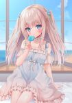  1girl ahoge blue_dress blue_eyes blush brown_hair clouds dress eating female_child food highres indoors long_hair looking_at_viewer nufucha original popsicle sitting sky solo sundress two_side_up window 