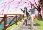  2girls absurdres ahoge animal_ears arm_up black_hair black_jacket blue_jacket blurry blurry_foreground brown_hair brown_shorts carrot_print casual cherry_blossoms child collarbone commentary_request ear_ornament falling_petals fence flower_in_eye food_print gold_hairband harayama_(mambition) highres holding_hands horse_ears horse_girl horse_tail jacket kitasan_black_(umamusume) long_hair long_sleeves multicolored_hair multiple_girls object_namesake official_alternate_costume petals pink_eyes pink_footwear pink_shorts pointing print_shirt purple_thighhighs red_eyes red_footwear river sakura_bakushin_o_(umamusume) shirt shorts sidelocks streaked_hair symbol_in_eye t-shirt tail thigh-highs track_jacket tree two-tone_hair umamusume very_long_hair walking white_hair 