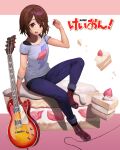  1girl absurdres bangs blue_goose blue_pants brown_eyes brown_footwear brown_hair cake cake_slice collarbone commentary copyright_name cross-laced_footwear electric_guitar food fruit full_body guitar hair_over_one_eye highres hirasawa_yui holding holding_food holding_fruit instrument k-on! listen!! looking_at_viewer medium_hair multicolored_background open_mouth pants pink_background short_sleeves sitting solo strawberry strawberry_shortcake white_background 