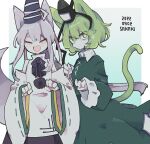  2girls cat_tail closed_eyes cosmicmind dress fang green_dress green_eyes green_hair hat kemonomimi_mode mononobe_no_futo multiple_girls open_mouth pom_pom_(clothes) ribbon-trimmed_sleeves ribbon_trim short_hair skin_fang skirt soga_no_tojiko tail tate_eboshi touhou wide_sleeves 