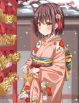  1girl bangs blush brown_hair closed_mouth commentary_request ema floral_print furisode hatsumoude highres hirorinwelcome japanese_clothes kimono long_sleeves looking_at_viewer new_year original short_hair smile snow solo wide_sleeves winter yellow_eyes 