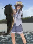  1girl animal blue_jacket blue_shorts brown_eyes brown_hair bucket_hat catfish clouds cordrawroy expressionless fish glass hat highres holding holding_animal holding_fish in_water jacket lake long_hair long_sleeves minakami_mai nichijou shirt shorts sidelocks sky solo standing striped striped_shirt tree water yellow_headwear 