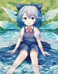  1girl ar_(maeus) blue_bow blue_dress blue_eyes blue_hair blush bow cirno dress grass hair_bow ice ice_wings looking_at_viewer outdoors puffy_short_sleeves puffy_sleeves red_ribbon ribbon shirt short_hair short_sleeves sitting sitting_on_water skirt solo tongue tongue_out touhou water white_shirt wings 