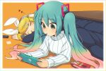  2girls bangs blonde_hair cellphone closed_eyes closed_mouth food food_in_mouth gradient_hair green_eyes green_hair hair_between_eyes hair_ornament hairclip handheld_game_console hatsune_miku holding kagamine_rin kotatsu long_hair long_sleeves lying mawaru_(mawaru) mouth_hold multicolored_hair multiple_girls on_stomach orange_background phone pink_hair pocky ribbed_sweater sleeves_past_wrists sweater table turtleneck turtleneck_sweater twintails under_kotatsu under_table very_long_hair vocaloid white_sweater 