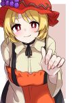  1girl aki_minoriko apron bangs blonde_hair breasts bright_pupils brown_background closed_mouth cowboy_shot food fruit grapes highres kameyan large_breasts leaning_forward looking_at_viewer red_apron red_eyes red_headwear short_hair smile solo standing touhou white_pupils 