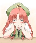  1girl beret braid drooling green_headwear half-closed_eyes hands_on_own_face hat hat_ornament head_rest hong_meiling long_hair looking_at_viewer nanana_(chicken_union) redhead solo star_(symbol) star_hat_ornament touhou twin_braids 