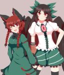  2girls ;d animal_ears arm_cannon black_hair black_wings bow braid cape cat_ears contrapposto green_bow green_skirt hair_bow highres kaenbyou_rin long_hair multiple_girls multiple_tails one_eye_closed red_eyes redhead reiuji_utsuho seo_haruto skirt smile tail thigh-highs third_eye touhou twin_braids weapon wings 