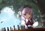  1girl ascot black_headwear blurry blurry_background board_game chess cup day grey_hair hat highres holding holding_cup long_sleeves outdoors puffy_long_sleeves puffy_sleeves sakayanagi_arisu solo tea teacup teapot tiered_tray violet_eyes ylpz_23 youkoso_jitsuryoku_shijou_shugi_no_kyoushitsu_e 