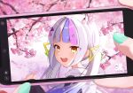  1girl :d bangs blunt_bangs blush commentary_request female_pov grey_hair highres hololive long_hair multicolored_hair murasaki_shion open_mouth oudon_(udonnaiyo) phone_screen pink_hair pov purple_hair short_eyebrows smile solo_focus streaked_hair triangle_hair_ornament twintails user_interface virtual_youtuber yellow_eyes 