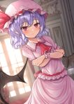  1girl ascot bangs bat_wings black_wings blurry blurry_background closed_mouth crossed_arms curtains dutch_angle fang hat hat_ribbon highres indoors looking_at_viewer mob_cap pink_headwear pink_shirt pink_skirt pointy_ears purple_hair red_ascot red_eyes red_ribbon reijing_etrn remilia_scarlet ribbon shirt short_hair skirt solo touhou window wings wrist_cuffs 