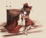  1girl bow brown_eyes brown_hair closed_mouth detached_sleeves dot_mouth expressionless flat_chest hair_bow hakurei_reimu head_tilt medium_hair neck_ribbon nontraditional_miko red_bow red_shirt ribbon shirt sitting sleeveless sleeveless_shirt solo tamarie_amareto touhou white_sleeves yellow_ribbon 