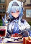  1girl absurdres alcohol bangs black_gloves black_hairband blue_hair blue_necktie blurry blurry_background blurry_foreground blush bodysuit box breasts butterfly_hair_ornament cake closed_mouth cup drinking_glass eula_(genshin_impact) food fork genshin_impact gift gift_box gloves gradient_eyes hair_between_eyes hair_ornament hairband happy_birthday highres holding holding_fork holding_knife knife large_breasts long_hair looking_at_viewer mon-chan multicolored_eyes necktie solo violet_eyes vision_(genshin_impact) wine_glass 
