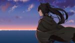  1girl absurdres animal_ears arknights black_cape blue_eyes blurry blurry_background cape clouds day depth_of_field from_behind gradient_sky highres horse_ears long_hair looking_afar looking_away meteor_(arknights) ocean outdoors parted_lips ponytail shijie_jianfa sky smile solo sunlight upper_body water 