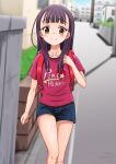  1girl backpack bag bangs black_hair blue_shorts blurry blurry_background blush brown_eyes building bush closed_mouth clothes_writing collarbone day depth_of_field feet_out_of_frame female_child hair_over_shoulder hidaka_toworu long_hair original outdoors print_shirt purple_shirt randoseru road shirt short_shorts short_sleeves shorts smile solo thighs walking 