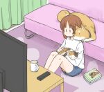 1girl animal blue_shorts boko_(girls_und_panzer) book brown_hair calico cat coffee_mug commentary controller couch cup dog girls_und_panzer holding holding_animal indoors loungewear motion_lines mug mutsu_(layergreen) nishizumi_miho no_mouth petting remote_control shiba_inu shirt short_hair shorts sitting solo steam t-shirt television white_shirt