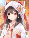 1girl autumn_leaves black_hair blurry blurry_background blush bow brown_eyes depth_of_field hair_bow hair_tubes hakurei_reimu highres hood japanese_clothes kimono light_smile long_hair looking_at_viewer outdoors red_bow reimu_tyuki shiromuku smile solo tassel touhou uchikake upper_body wataboushi white_kimono