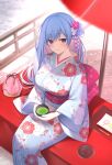  1girl absurdres blue_eyes blue_flower blue_hair blue_kimono blush breasts closed_mouth coin_purse commentary cup day emori_miku emori_miku_project feet_out_of_frame floral_print flower from_above green_tea hair_bun hair_flower hair_ornament highres holding holding_cup japanese_clothes kagachi_saku kimono large_breasts long_hair long_sleeves looking_at_viewer miko_(royal_milk) obi outdoors pink_flower pink_sash print_kimono railing safe sash second-party_source sitting smile solo sunlight symbol-only_commentary tea umbrella very_long_hair white_flower wide_sleeves 