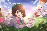  1girl :d bangs blush bob_cut brown_eyes brown_hair cardigan clouds collared_dress commentary_request day dress dynamax_band eggshell gloria_(pokemon) grass green_headwear grey_cardigan haru_(haruxxe) hat hatching highres hooded_cardigan lying on_stomach open_mouth outdoors pink_dress pokemon pokemon_(creature) pokemon_(game) pokemon_swsh scorbunny short_hair sky smile tam_o&#039;_shanter tongue 