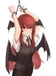  1girl absurdres aisumegane arms_up bat_wings black_skirt black_vest blush buttons chain clenched_teeth collared_shirt commentary_request cowboy_shot cuffs dress_shirt eyes_visible_through_hair hair_between_eyes handcuffs head_wings highres koakuma long_hair low_wings necktie red_eyes red_necktie redhead restrained shirt short_sleeves sidelocks simple_background skirt skirt_set solo teeth touhou v-shaped_eyebrows very_long_hair vest white_background white_shirt wings 