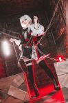  1girl boots chain cosplay_photo dtto. high_heel_boots high_heels highres indoors pale_skin photo_(medium) red_eyes scarz solo taotan1412 utaite_(singer) virtual_youtuber white_hair 