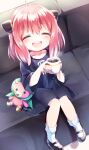 1girl anya_(spy_x_family) bangs blush child closed_eyes couch cup director_chimera_(spy_x_family) dress female_child hairpods happy highres holding holding_cup hot_chocolate mani_(second-dimension) medium_hair open_mouth sitting smile solo spy_x_family stuffed_toy 