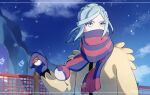  1boy blue_hair clouds commentary_request fence grusha_(pokemon) highres holding holding_poke_ball jacket long_hair long_sleeves male_focus mittens outdoors pankona_(ubsssss) poke_ball poke_ball_(basic) pokemon pokemon_(game) pokemon_sv scarf scarf_over_mouth sky snowflakes snowing solo twitter_username upper_body yellow_jacket 