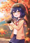  1girl :3 :d autumn autumn_leaves bangs blue_hair blush bow cabbie_hat camera camera_around_neck cardigan dappled_sunlight hat hat_bow highres holding holding_camera leaf leaf_on_head long_sleeves looking_at_viewer maple_leaf nanase_(ribonshitoron) neckerchief open_mouth original outdoors pleated_skirt school_uniform serafuku short_hair skirt smile solo sunlight tree yellow_eyes 