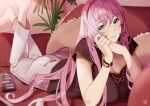  1girl bangs barefoot blue_eyes bracelet breasts cellphone charging_device couch hairband jewelry large_breasts long_hair looking_at_viewer lying megurine_luka momonosa_oekaki on_couch on_stomach pants phone pink_hair shirt smile solo t-shirt vocaloid wire 