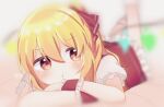  1girl blonde_hair blurry blurry_background blurry_foreground close-up crossed_arms depth_of_field flandre_scarlet frilled_skirt frilled_sleeves frills hair_between_eyes heart heart-shaped_pupils highres legs_up looking_at_viewer lying medium_hair multicolored_wings no_headwear on_stomach pout puffy_short_sleeves puffy_sleeves red_eyes red_skirt red_vest shihara_hazuki_816 short_sleeves skirt skirt_set solo symbol-shaped_pupils touhou vest wings wrist_cuffs 