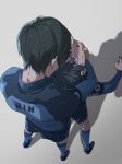  2boys bangs black_footwear black_hair blue_eyes blue_lock blue_shirt blue_shorts blue_socks blue_tkse character_name chromatic_aberration from_above full_body grabbing grabbing_from_behind grey_background hand_on_another&#039;s_chin highres isagi_yoichi itoshi_rin long_sleeves looking_at_another male_focus multiple_boys open_mouth shadow shirt shoes short_hair shorts simple_background soccer_uniform socks sportswear standing 