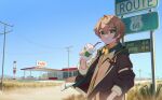  1boy brown_hair brown_jacket cactus commentary commission cup day disposable_cup drinking_straw gas_station green_eyes green_hair heim_(vtuber) highres holding holding_cup indie_virtual_youtuber jacket jl_tan looking_at_viewer male_focus multicolored_hair outdoors pixiv_commission power_lines route_66 sign solo streaked_hair upper_body utility_pole virtual_youtuber 