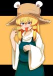  1girl bangs black_background blonde_hair blue_eyes blue_skirt blue_vest blush breasts brown_headwear closed_mouth commentary_request cowboy_shot hair_between_eyes hair_ribbon hat highres horizontal_pupils kurodani_yamame long_hair long_sleeves looking_at_viewer moriya_suwako orange_background red_ribbon ribbon rinyamame shirt skirt skirt_set small_breasts smile solo tongue tongue_out touhou turtleneck two-tone_background vest white_shirt wide_sleeves 