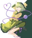  1girl artist_name black_footwear boots dress green_background green_dress green_eyes green_hair green_headwear heart highres karane_5656 komeiji_koishi legs long_sleeves looking_at_viewer open_mouth own_hands_clasped own_hands_together shirt short_hair solo touhou two-tone_background white_background yellow_shirt 