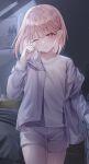  1girl bangs bed closed_mouth cowboy_shot doka_l hand_on_own_face indoors jacket one_eye_closed ootori_emu open_clothes open_jacket pillow pink_eyes pink_hair poster_(object) project_sekai purple_jacket short_hair shorts sidelocks sleepwear solo standing white_shorts 