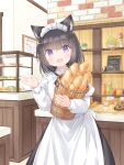  1girl :d animal_ear_fluff animal_ears apron baguette bangs basket black_hair black_skirt bread cat_ears commentary_request cupcake doughnut fang food indoors juliet_sleeves komugi_(wataame27) long_sleeves looking_at_viewer maid_headdress object_hug original puffy_sleeves shirt skirt smile solo translation_request violet_eyes waitress wataame27 white_apron white_shirt 